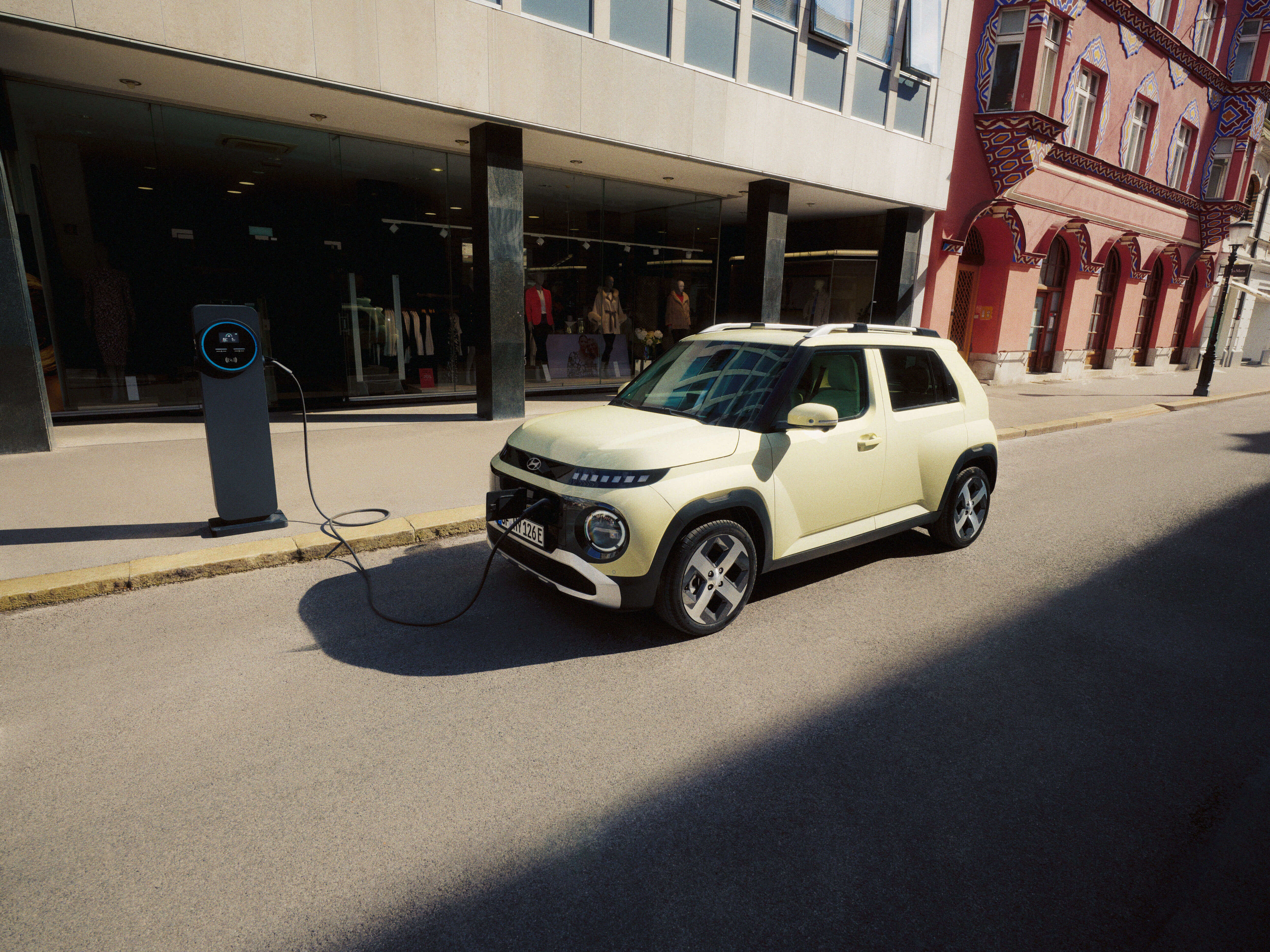 INSTER is charging up in front of a clothing store.