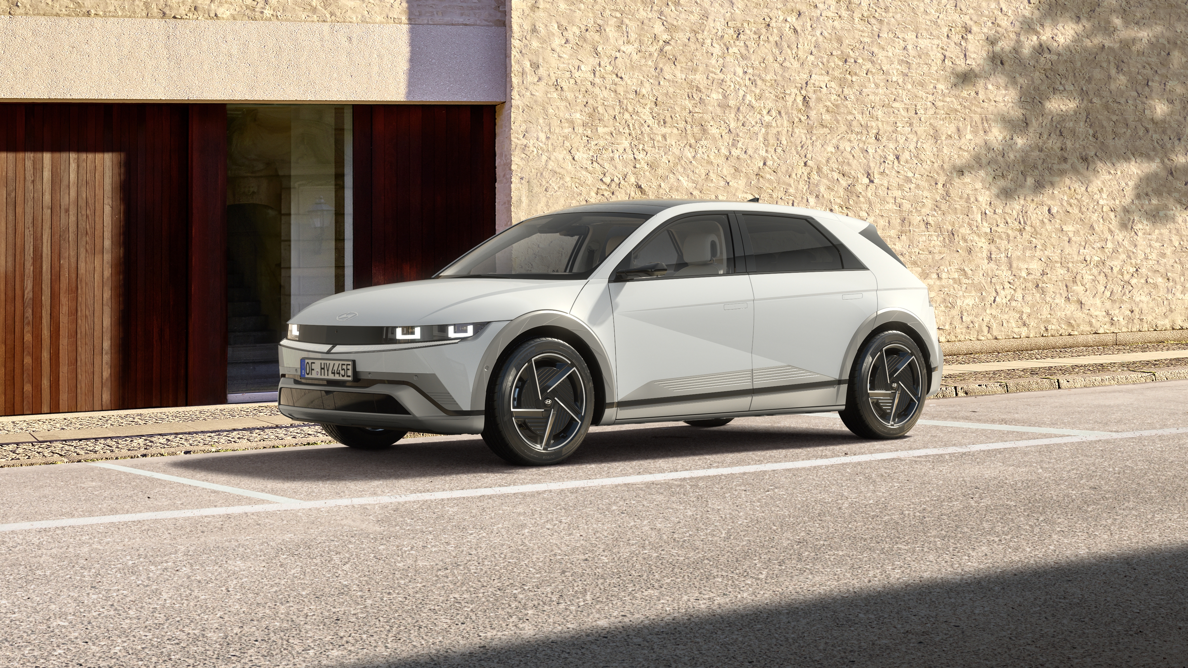 Ioniq 5 in front of the building.