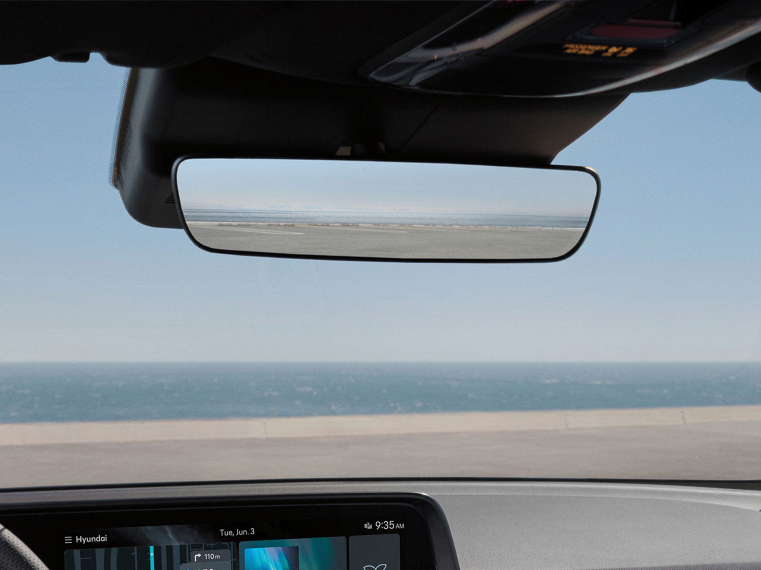 The frameless rear view mirror inside the new Hyundai IONIQ 6 electric sedan.