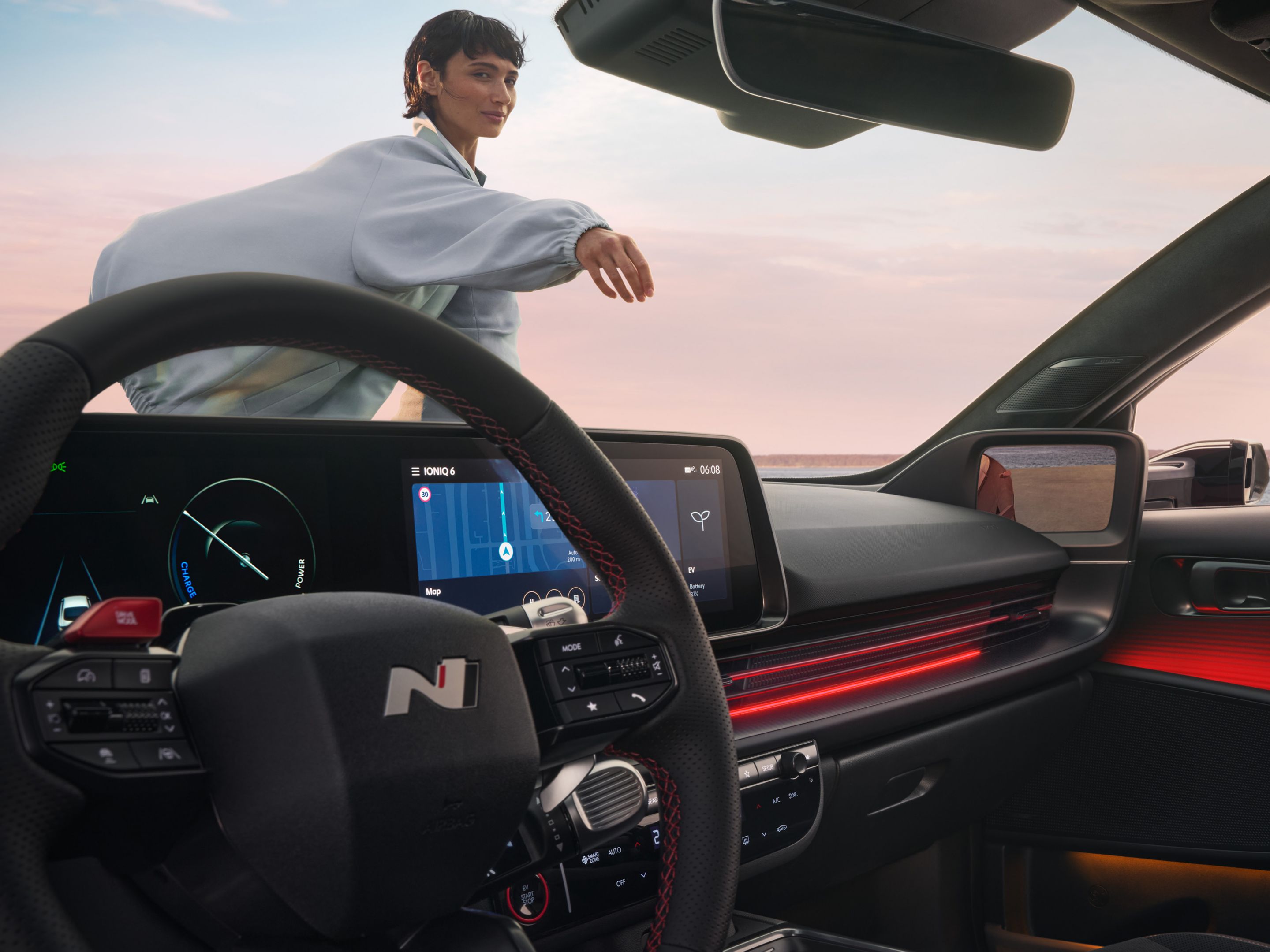 Sporty red accents inside the cockpit of the Hyundai IONIQ 6 N Line electric sedan.