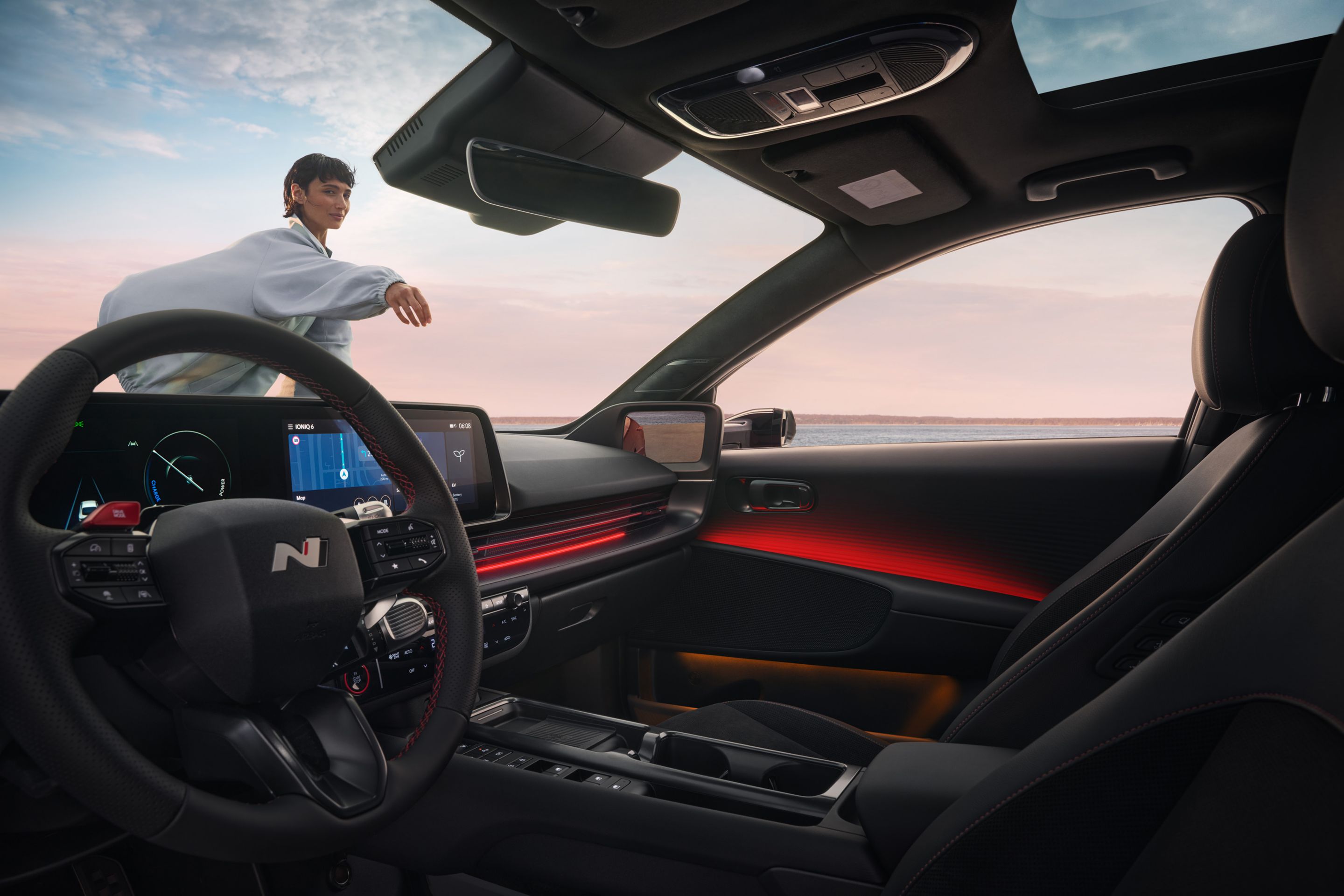 Sporty red accents inside the cockpit of the Hyundai IONIQ 6 N Line electric sedan.