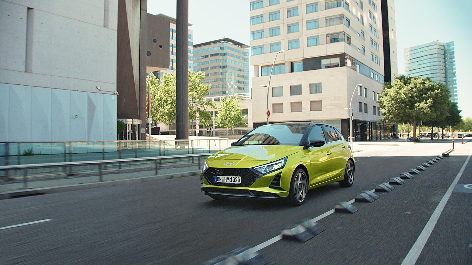 The Hyundai i20 driving down a street.