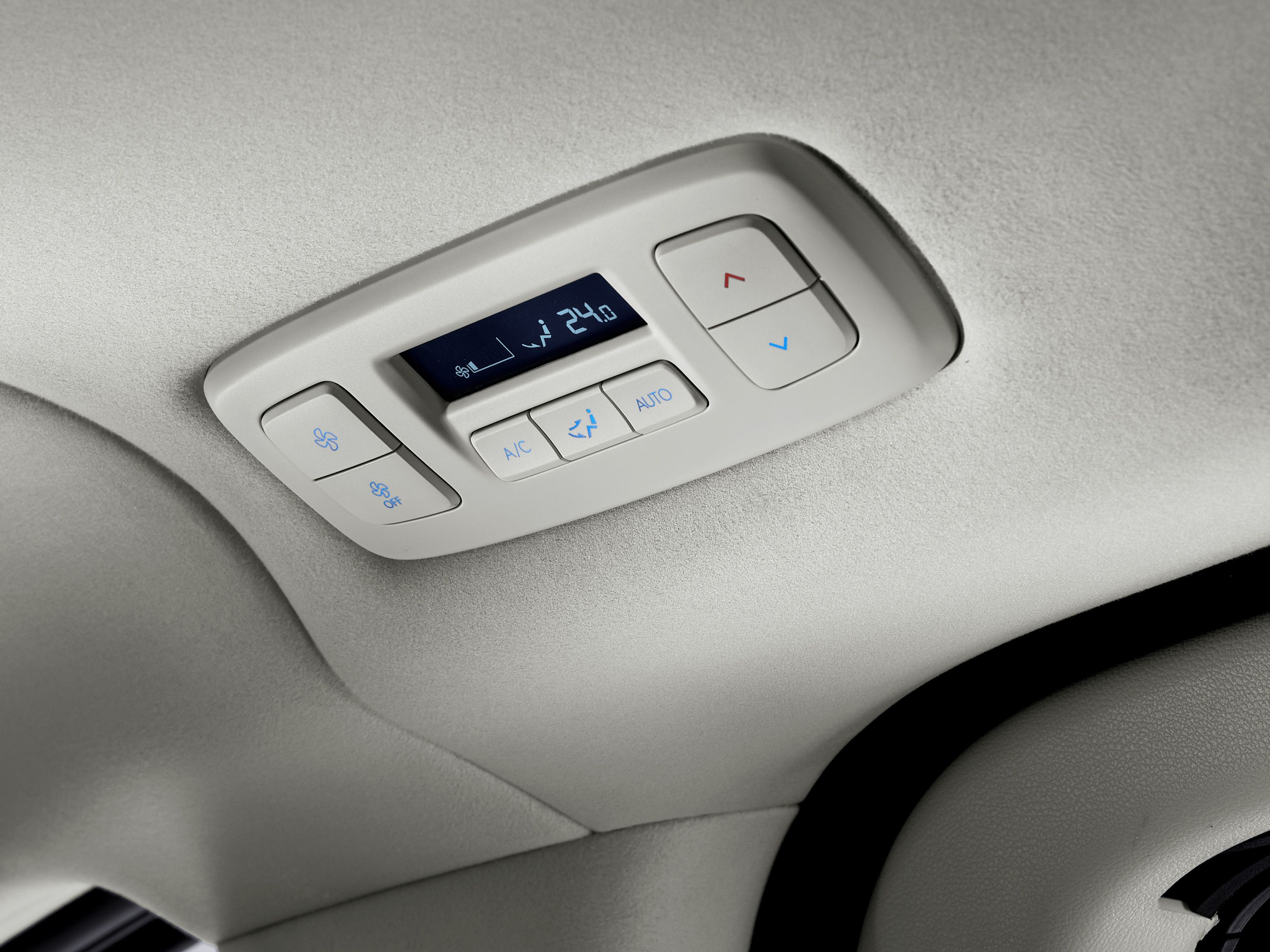 Hyundai STARIA Electric rear climate control panel with digital display and airflow settings.