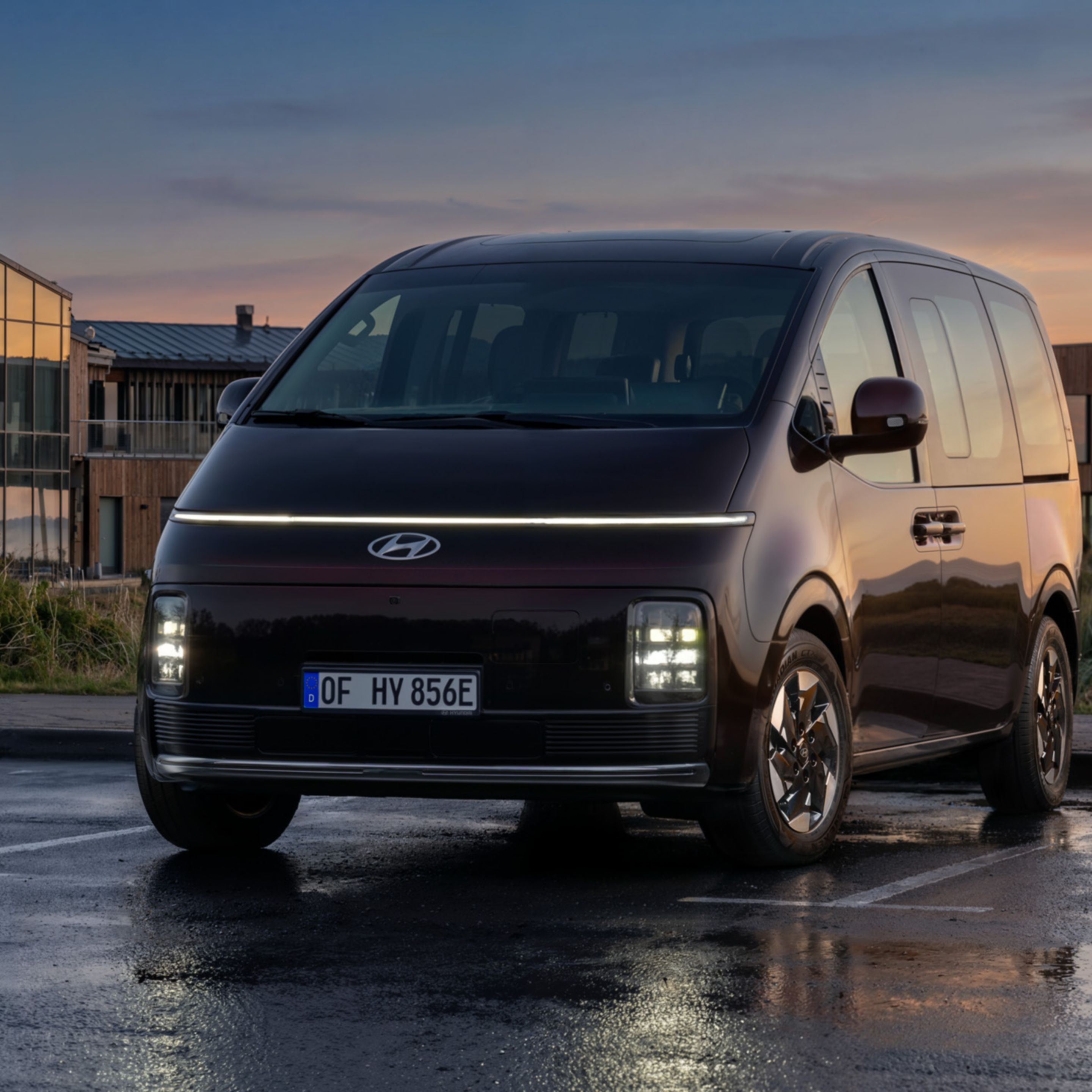 Hyundai Staria Electric front view at sunset.